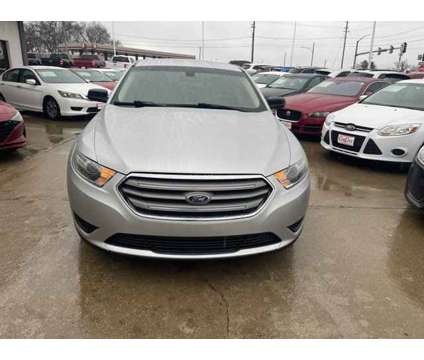 2016 Ford Taurus SE is a Silver 2016 Ford Taurus SE Car for Sale in Des Moines IA