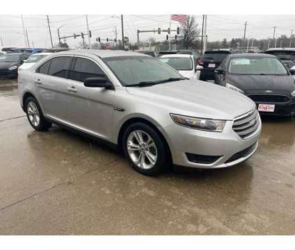 2016 Ford Taurus SE is a Silver 2016 Ford Taurus SE Car for Sale in Des Moines IA