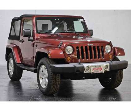 2009 Jeep Wrangler Sahara is a Red 2009 Jeep Wrangler Sahara Car for Sale in Morton Grove IL