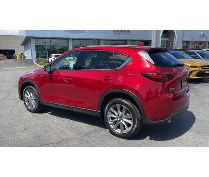 2021 Mazda CX-5 Grand Touring is a Red 2021 Mazda CX-5 Grand Touring Car for Sale in Cerritos CA