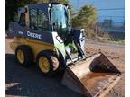 2015 John Deere 318E skid steer loader