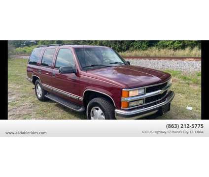 1999 Chevrolet Tahoe for sale is a Red 1999 Chevrolet Tahoe 1500 2dr Car for Sale in Haines City FL