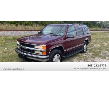 1999 Chevrolet Tahoe for sale is a Red 1999 Chevrolet Tahoe 1500 4dr Car for Sale in Haines City FL