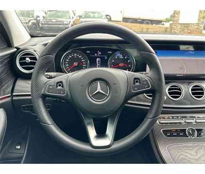 2018 Mercedes-Benz E-Class 4MATIC is a Black 2018 Mercedes-Benz E Class Sedan in Auburn AL