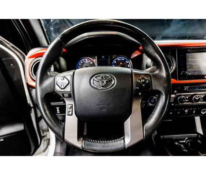 2016 Toyota Tacoma TRD Off Road is a White 2016 Toyota Tacoma TRD Off Road Truck in Peoria AZ