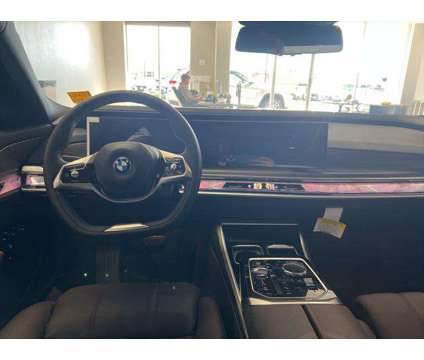 2024 BMW i7 xDrive60 is a Gold 2024 Sedan in Dubuque IA