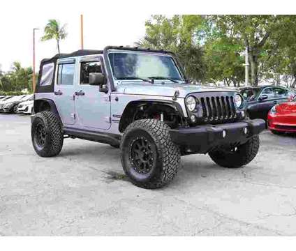 2016 Jeep Wrangler Unlimited Sport is a Silver 2016 Jeep Wrangler Unlimited SUV in Miami FL
