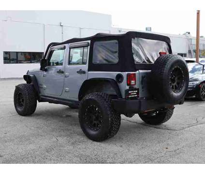 2016 Jeep Wrangler Unlimited Sport is a Silver 2016 Jeep Wrangler Unlimited SUV in Miami FL