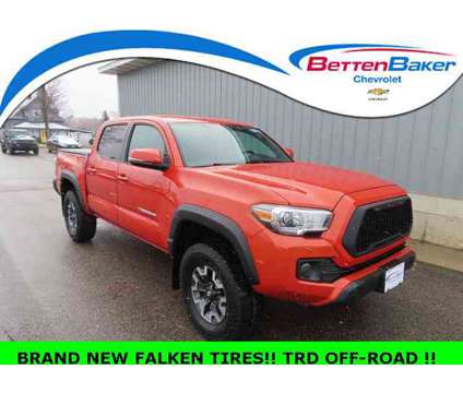 2017 Toyota Tacoma TRD Off-Road is a Red 2017 Toyota Tacoma TRD Off Road Truck in Cadillac MI