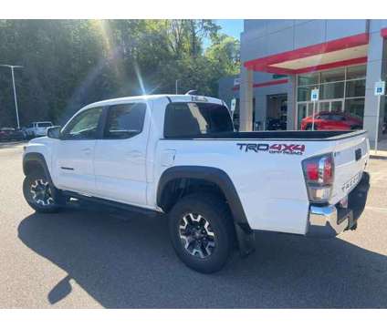 2021 Toyota Tacoma TRD Off-Road V6 is a White 2021 Toyota Tacoma TRD Off Road Truck in Vicksburg MS