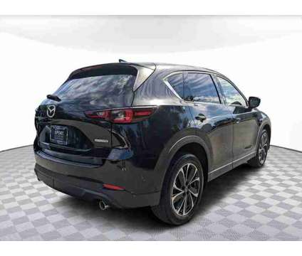 2023 Mazda CX-5 2.5 S Premium Plus Package is a Black 2023 Mazda CX-5 SUV in Orlando FL