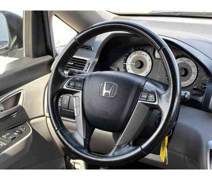 2013 Honda Odyssey for sale is a Grey 2013 Honda Odyssey Car for Sale in Lincoln NE