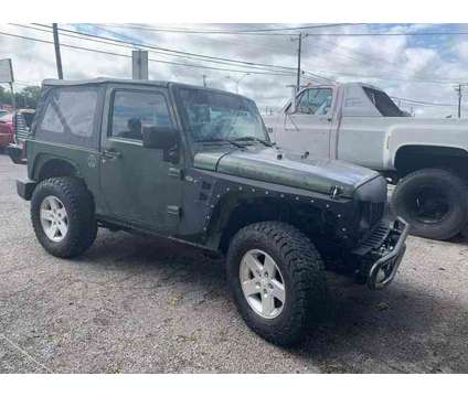 2009 Jeep Wrangler for sale is a Green 2009 Jeep Wrangler Car for Sale in Sherman TX
