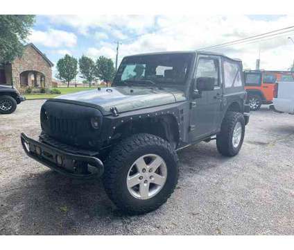 2009 Jeep Wrangler for sale is a Green 2009 Jeep Wrangler Car for Sale in Sherman TX