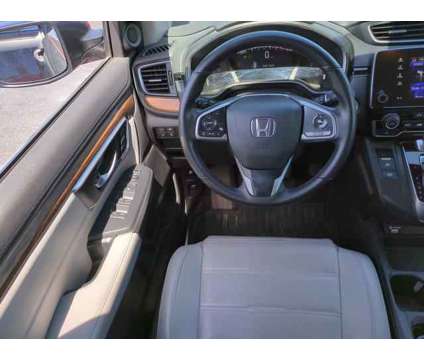 2020 Honda CR-V AWD EX-L is a Grey 2020 Honda CR-V EX-L SUV in Daytona Beach FL