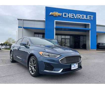 2019 Ford Fusion SEL is a Blue 2019 Ford Fusion SEL Car for Sale in Olathe KS