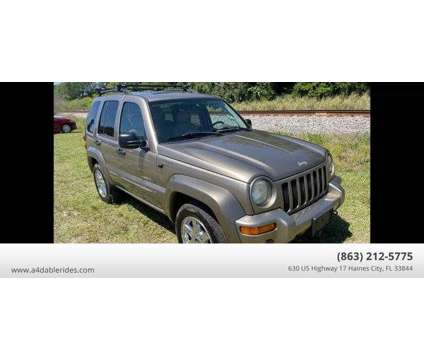 2003 Jeep Liberty for sale is a Gold 2003 Jeep Liberty Car for Sale in Haines City FL
