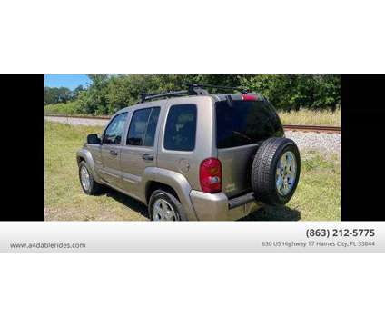 2003 Jeep Liberty for sale is a Gold 2003 Jeep Liberty Car for Sale in Haines City FL