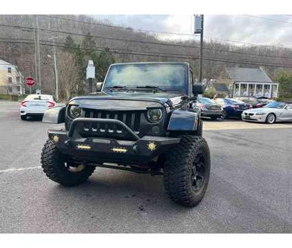 2012 Jeep Wrangler for sale is a Black 2012 Jeep Wrangler Car for Sale in Ridgefield CT