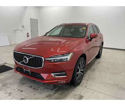 2021 Volvo XC60 T6 Inscription is a Red 2021 Volvo XC60 T6 SUV in Logan UT