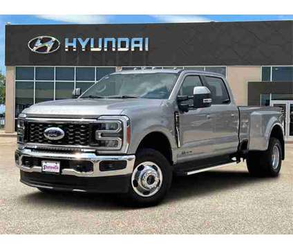 2023 Ford F-350 LARIAT is a Silver 2023 Ford F-350 Lariat Truck in Granbury TX