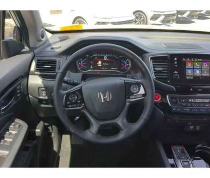2021 Honda Pilot AWD Touring 8 Passenger is a White 2021 Honda Pilot SUV in Bradenton FL