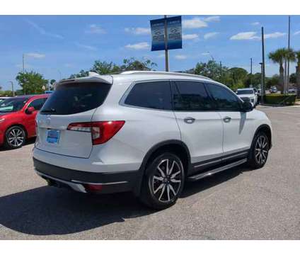 2021 Honda Pilot AWD Touring 8 Passenger is a White 2021 Honda Pilot SUV in Bradenton FL