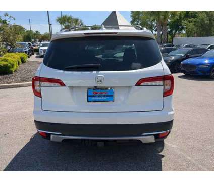 2021 Honda Pilot AWD Touring 8 Passenger is a White 2021 Honda Pilot SUV in Bradenton FL