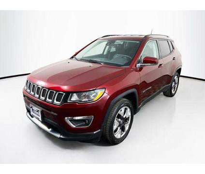 2021 Jeep Compass Limited 4X4 is a Red 2021 Jeep Compass Limited SUV in Madison WI