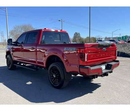 2022 Ford F-250 LARIAT is a Red 2022 Ford F-250 Lariat Truck in Utica NY