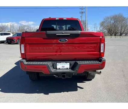 2022 Ford F-250 LARIAT is a Red 2022 Ford F-250 Lariat Truck in Utica NY