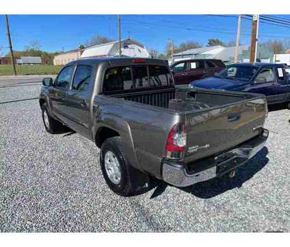 2011 Toyota Tacoma Double Cab for sale is a Tan 2011 Toyota Tacoma Double Cab Car for Sale in Thomasville NC