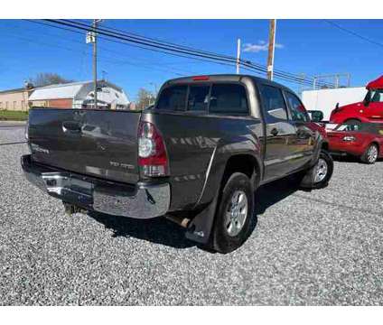 2011 Toyota Tacoma Double Cab for sale is a Tan 2011 Toyota Tacoma Double Cab Car for Sale in Thomasville NC