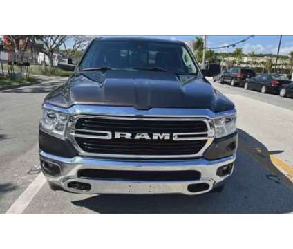 2021 Ram 1500 Quad Cab for sale is a Brown 2021 RAM 1500 Model Car for Sale in Miami FL
