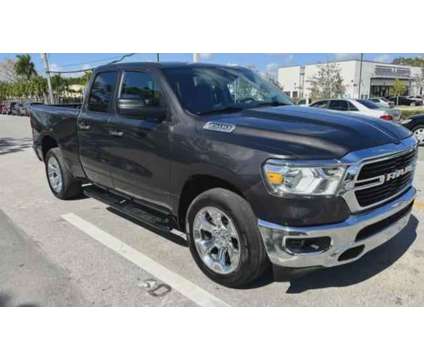 2021 Ram 1500 Quad Cab for sale is a Brown 2021 RAM 1500 Model Car for Sale in Miami FL