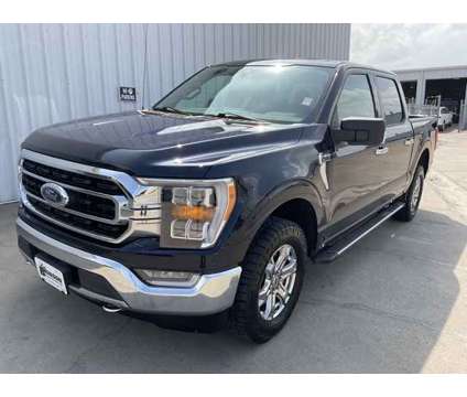 2021 Ford F-150 XLT is a Blue 2021 Ford F-150 XLT Truck in Corsicana TX