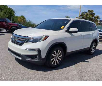 2019 Honda Pilot EX-L is a White 2019 Honda Pilot EX SUV in Bradenton FL