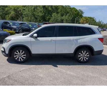 2019 Honda Pilot EX-L is a White 2019 Honda Pilot EX SUV in Bradenton FL