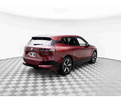 2024 BMW iX xDrive50 is a Red 2024 BMW 325 Model iX SUV in Barrington IL