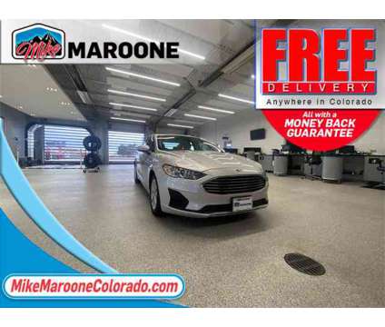 2019 Ford Fusion Hybrid SE is a Silver 2019 Ford Fusion Hybrid SE Hybrid in Colorado Springs CO