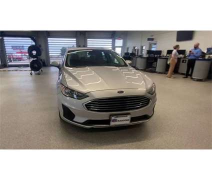 2019 Ford Fusion Hybrid SE is a Silver 2019 Ford Fusion Hybrid SE Hybrid in Colorado Springs CO