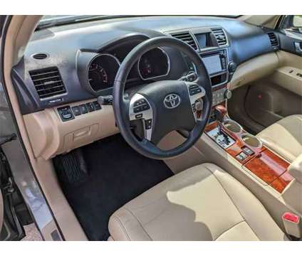 2013 Toyota Highlander Limited V6 is a Brown 2013 Toyota Highlander Limited SUV in Kenosha WI