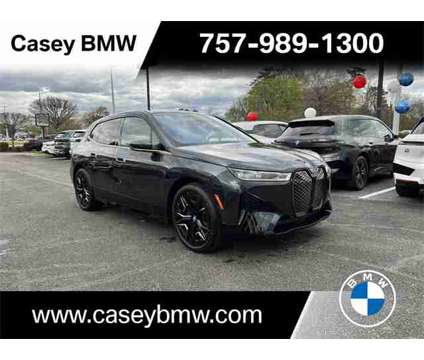 2024 BMW iX M60 is a Grey 2024 BMW 325 Model iX SUV in Newport News VA
