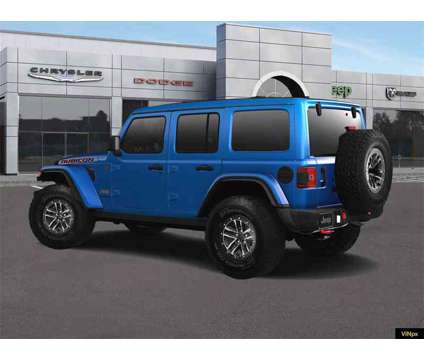 2024 Jeep Wrangler Rubicon is a Blue 2024 Jeep Wrangler Rubicon SUV in Walled Lake MI