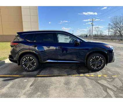 2024 Nissan Rogue Platinum is a Blue 2024 Nissan Rogue SUV in Waukesha WI