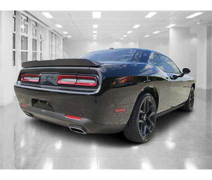 2022 Dodge Challenger SXT is a Black 2022 Dodge Challenger SXT Car for Sale in Orlando FL
