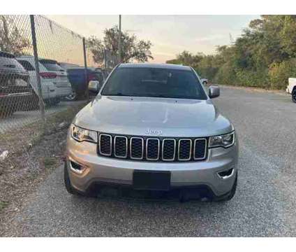 2019 Jeep Grand Cherokee Laredo E is a Silver 2019 Jeep grand cherokee Laredo Car for Sale in Orlando FL