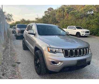 2019 Jeep Grand Cherokee Laredo E is a Silver 2019 Jeep grand cherokee Laredo Car for Sale in Orlando FL