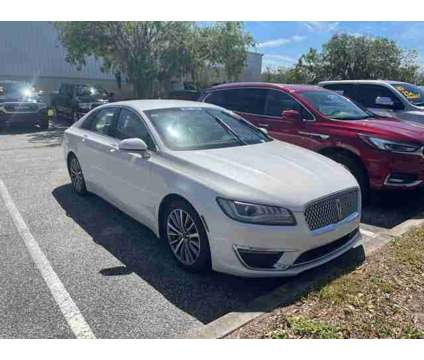 2017 Lincoln Mkz Select is a White 2017 Lincoln MKZ Select Car for Sale in Orlando FL