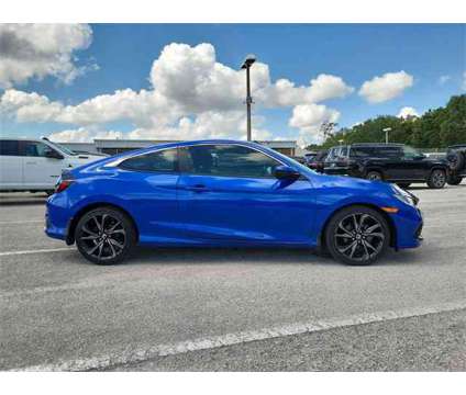 2019 Honda Civic Sport is a Blue 2019 Honda Civic Sport Car for Sale in Orlando FL